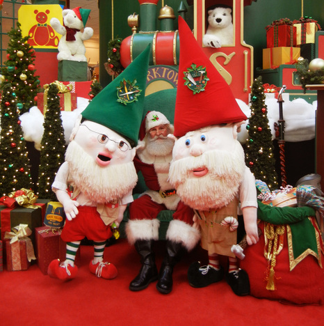 Wally and Victor (Christmas Elves) take a picture with santa clause at Yorktown mall.